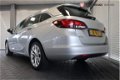 Opel Astra Sports Tourer - Edition 1.0 Turbo | Navigatie | Schuif / kanteldak | 6 mnd Bovag garantie - 1 - Thumbnail