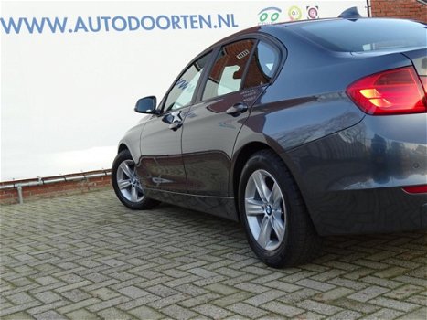 BMW 3-serie - 320i High Executive Rijklaar garantie - 1