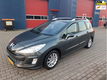 Peugeot 308 SW - 1.6 HDiF XS Première - 1 - Thumbnail