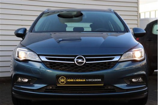 Opel Astra - 105pk Turbo Edition (Climate/NAV./PDC/NL AUTO) - 1