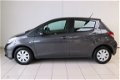 Toyota Yaris - 1.3 VVT-i Now | Airco | 1ste eigenaar | Elektrische ramen | - 1 - Thumbnail