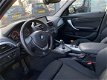 BMW 1-serie - 118i Sport Automaat, Xenon, Prof Nav, Nieuwe ketting, Sunroof, stoelverw, PDC V+A, LM - 1 - Thumbnail