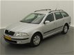 Skoda Octavia Combi - 1.6 Ambiente / airco / cruise / trekhaak / zilver-metallic - 1 - Thumbnail