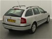 Skoda Octavia Combi - 1.6 Ambiente / airco / cruise / trekhaak / zilver-metallic - 1 - Thumbnail