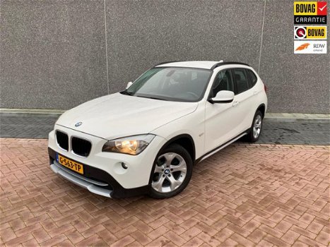 BMW X1 - SDrive18i Executive | 6 MND GARANTIE | APK BIJ AFLEVERING | AFLEVERBEURT | NIEUWSTAAT - 1