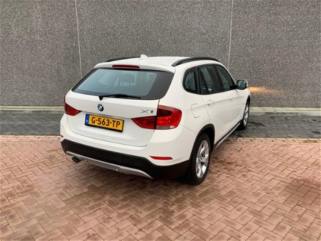 BMW X1 - SDrive18i Executive | 6 MND GARANTIE | APK BIJ AFLEVERING | AFLEVERBEURT | NIEUWSTAAT - 1