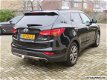 Hyundai Santa Fe - 2.4 GDI CVVT 4WD i-Catcher 7 pers - 1 - Thumbnail