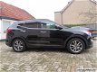 Hyundai Santa Fe - 2.4 GDI CVVT 4WD i-Catcher 7 pers - 1 - Thumbnail