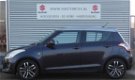 Suzuki Swift - 1.2 Style EASSS I Airco I Lichtmetalen Velgen I Elektrische ramen I Cruise Control I - 1 - Thumbnail