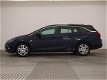 Opel Astra Sports Tourer - 1.0 Business+ A/C NAV SP.STOELEN PDC V+A CC - 1 - Thumbnail