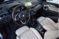 BMW X1 - 1.8d 150PK sDrive High Executive Sport LEDER/NAP/GROOT-NAVI - 1 - Thumbnail