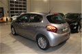 Peugeot 208 - 1.2 PureTech Signature 110PK Automaat | Navigatie | Cruise Control | Parkeersensoren | - 1 - Thumbnail