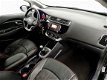 Kia Rio - 1.2 CVVT 5drs Dynamicline (leer, navi.LED, cruise) - 1 - Thumbnail