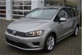 Volkswagen Golf Sportsvan - 1.2 TSI 110pk Comfortline | Navigatie | Climate control | Achteruitrijca - 1 - Thumbnail