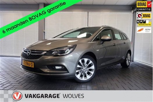 Opel Astra Sports Tourer - Business Edition 1.0 Turbo | navigatie | schuif / kanteldak | parkpilot | - 1