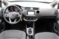 Kia Rio - 1.2 CVVT Comfort Pack *NAVIGATIE / TREKHAAK - 1 - Thumbnail