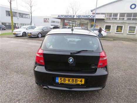 BMW 1-serie - 116i Business Line NL auto, incl. winterset, clima, nieuwstaat Nieuwjaarssale - 1