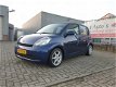 Daihatsu Sirion 2 - 1.0-12V Trend Airco, weinig kmstand nette auto - 1 - Thumbnail