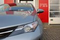 Toyota Auris - 1.8 Hybrid Aspiration met navigatie en trekhaak - 1 - Thumbnail
