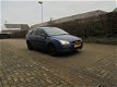 Ford Focus Wagon - 1.4-16V Ambiente - 1 - Thumbnail