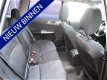 Subaru Forester - 2.0 XS Luxury dealer auto | opendak | xenon | trekhaak | 116.000 KM | 4WD - 1 - Thumbnail