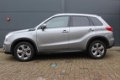 Suzuki Vitara - 1.6 2WD Aut Exclusive Navi, Cruise, org.NL Auto - 1 - Thumbnail