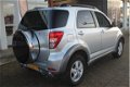 Daihatsu Terios - 1.5-16v Exclusive 4x4 / Airco/ 1e eigenaar/ LM velgen - 1 - Thumbnail