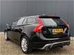 Volvo V60 - D4 180PK R-Design / Bluetooth / Cruise Control / Navigatie / Trekhaak / PDC achter - 1 - Thumbnail