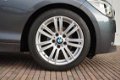 BMW 1-serie - 116i 5-deurs Executive M Sportpakket - 1 - Thumbnail