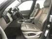 BMW X3 - 2.0d High Executive / Navi / Stoelverw. / Park. Sens. / NAP - 1 - Thumbnail