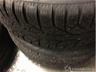 Ford Focus - compleet set winterbanden (diep in profiel) / 4x michelin + wieldoppen van michelin - 1 - Thumbnail