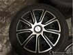 Ford Focus - compleet set winterbanden (diep in profiel) / 4x michelin + wieldoppen van michelin - 1 - Thumbnail