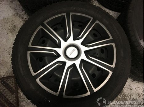 Ford Focus - compleet set winterbanden (diep in profiel) / 4x michelin + wieldoppen van michelin - 1