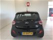 Hyundai i10 - 1.0i i-Motion Comf. | Climate | Cruise | € 1.000, - Slooppremie - 1 - Thumbnail