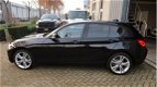 BMW 1-serie - 118i Sport LINE/5DRS/NAVI/STOELVERWARMING - 1 - Thumbnail