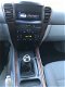 Kia Sorento - 2.4i EX 4x4/AIRCO/NAP/CRUISE/Elec.Ram - 1 - Thumbnail