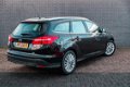 Ford Focus Wagon - 1.0 Titanium Edition | Navigatie | Klimaat + Cruise control | Parkeersensoren | D - 1 - Thumbnail