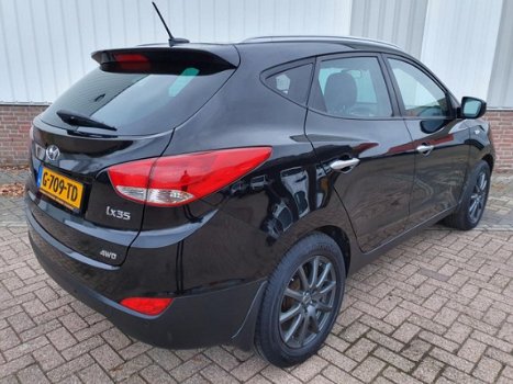 Hyundai ix35 - 2.0i 4WD Style Vol Leer*Navigatie*PDC*Climate control*Bluetooth - 1