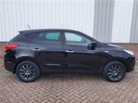 Hyundai ix35 - 2.0i 4WD Style Vol Leer*Navigatie*PDC*Climate control*Bluetooth - 1