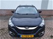 Hyundai ix35 - 2.0i 4WD Style Vol Leer*Navigatie*PDC*Climate control*Bluetooth - 1 - Thumbnail