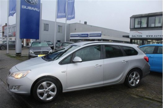 Opel Astra Sports Tourer - 1.6 Turbo Cosmo 180 PK / LAGE KM / NAVIGATIE / TREKHAAK - 1