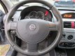 Opel Corsa - 1.2-16V NJOY (APK t/m 06-12-2020) - 1 - Thumbnail