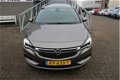 Opel Astra Sports Tourer - 1.0 Business+ Navigatie/Cruise controle/Airco/Parkeersensoren voor+achter - 1 - Thumbnail