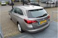 Opel Astra Sports Tourer - 1.0 Business+ Navigatie/Cruise controle/Airco/Parkeersensoren voor+achter - 1 - Thumbnail