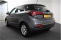 Hyundai i20 - 1.25 MPI Style (Navigatie/Blue tooth/Cruise control/LMV/Camera/PDC) - 1 - Thumbnail