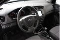 Hyundai i20 - 1.25 MPI Style (Navigatie/Blue tooth/Cruise control/LMV/Camera/PDC) - 1 - Thumbnail