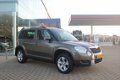 Skoda Yeti - 1.2 TSI Comfort 105pk Automaat - Navigatie - 1 - Thumbnail