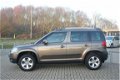 Skoda Yeti - 1.2 TSI Comfort 105pk Automaat - Navigatie - 1 - Thumbnail