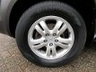 Hyundai Tucson - 2.0i Dynamic Cross Dealer onderhouden/ Cruise control/ Airco/ Parkeersensoren - 1 - Thumbnail