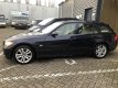 BMW 3-serie Touring - 325xi High Executive Xenon Navigatie panoramadak climate controle leer memory - 1 - Thumbnail